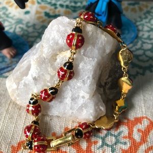 Joan Rivers lady bug bracelet